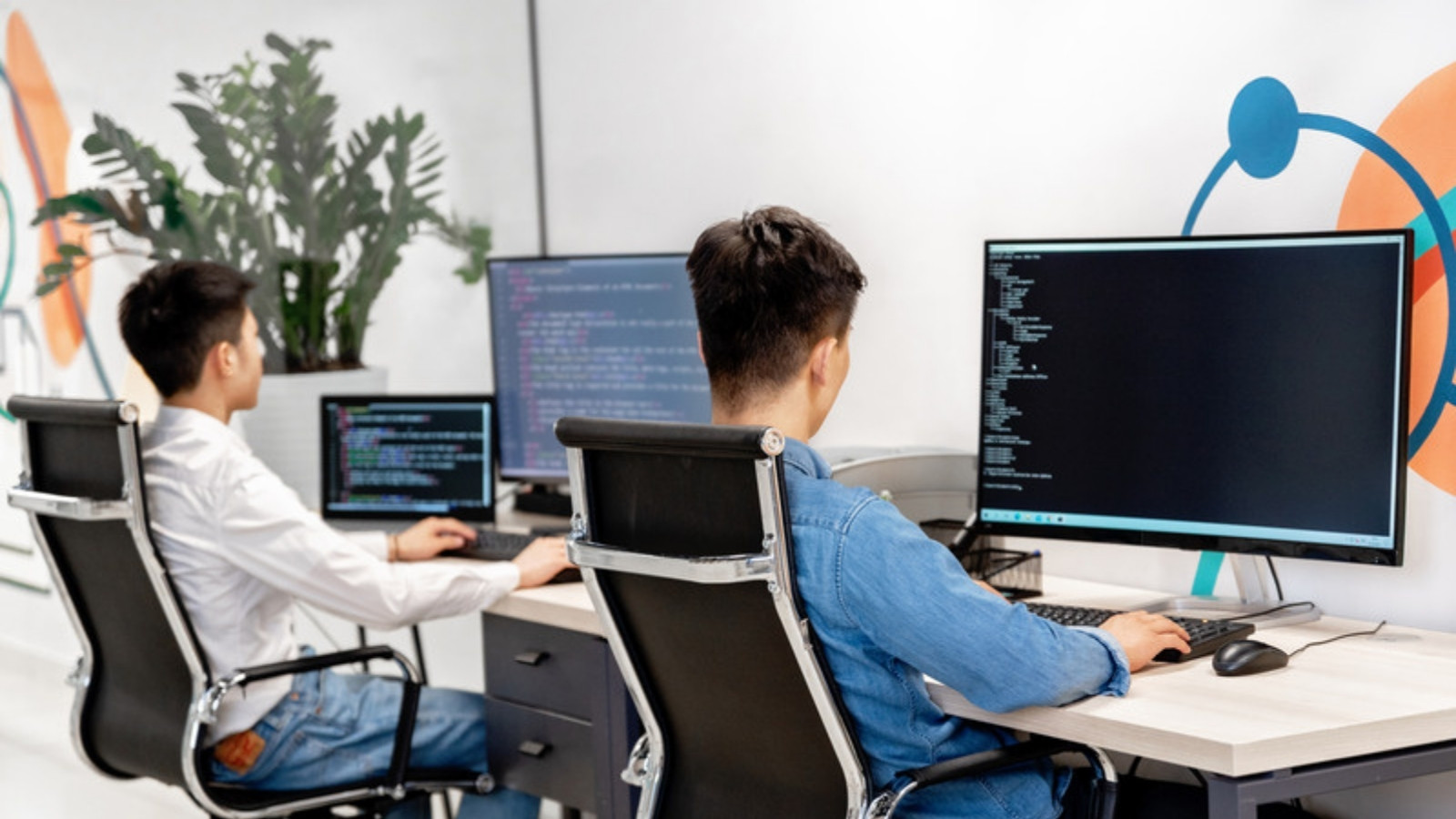 Developers pair programming together