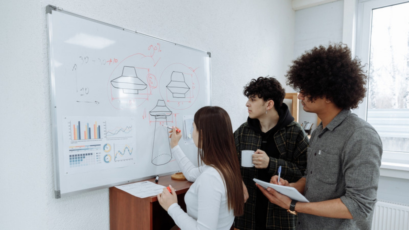 Software team planning a product on a whiteboard