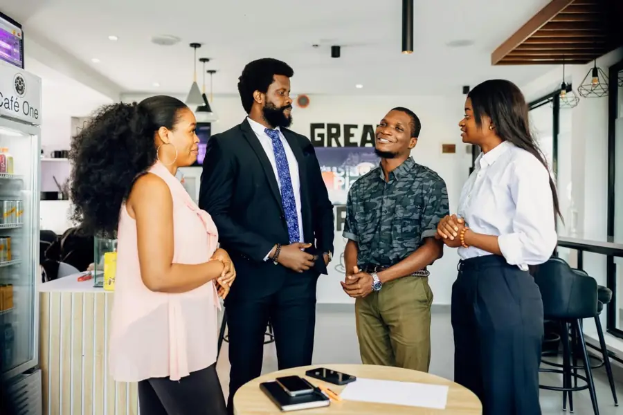 Business team talking together in a modern office